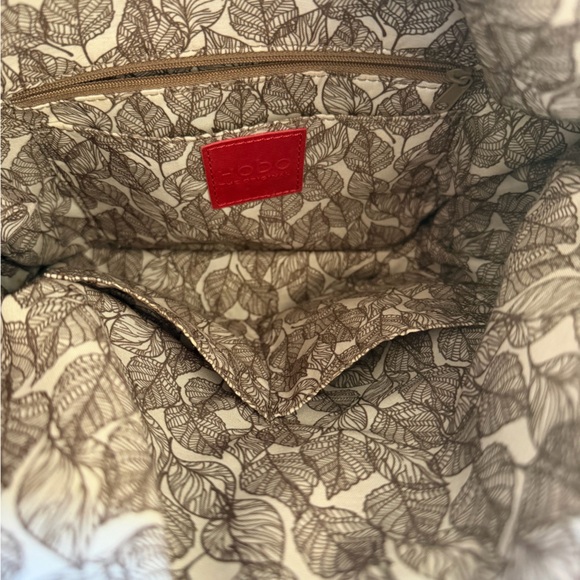 HOBO Blue Convertable Bag with Brown Leaf Patterned Interior - Picture 7 of 10